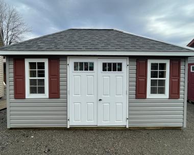 10x16 Hip Roof with Vinyl Siding and Shelves